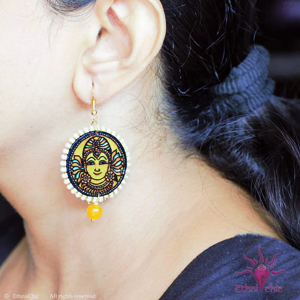 Close-up of a woman wearing the Kerala Mural Hand-Painted danglers with Yellow Mural Yellow without jhumka